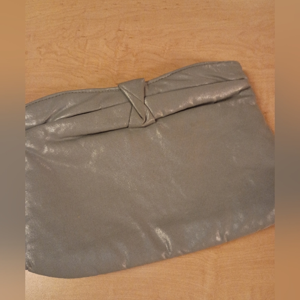 mark. Shimmering Silver Clutch